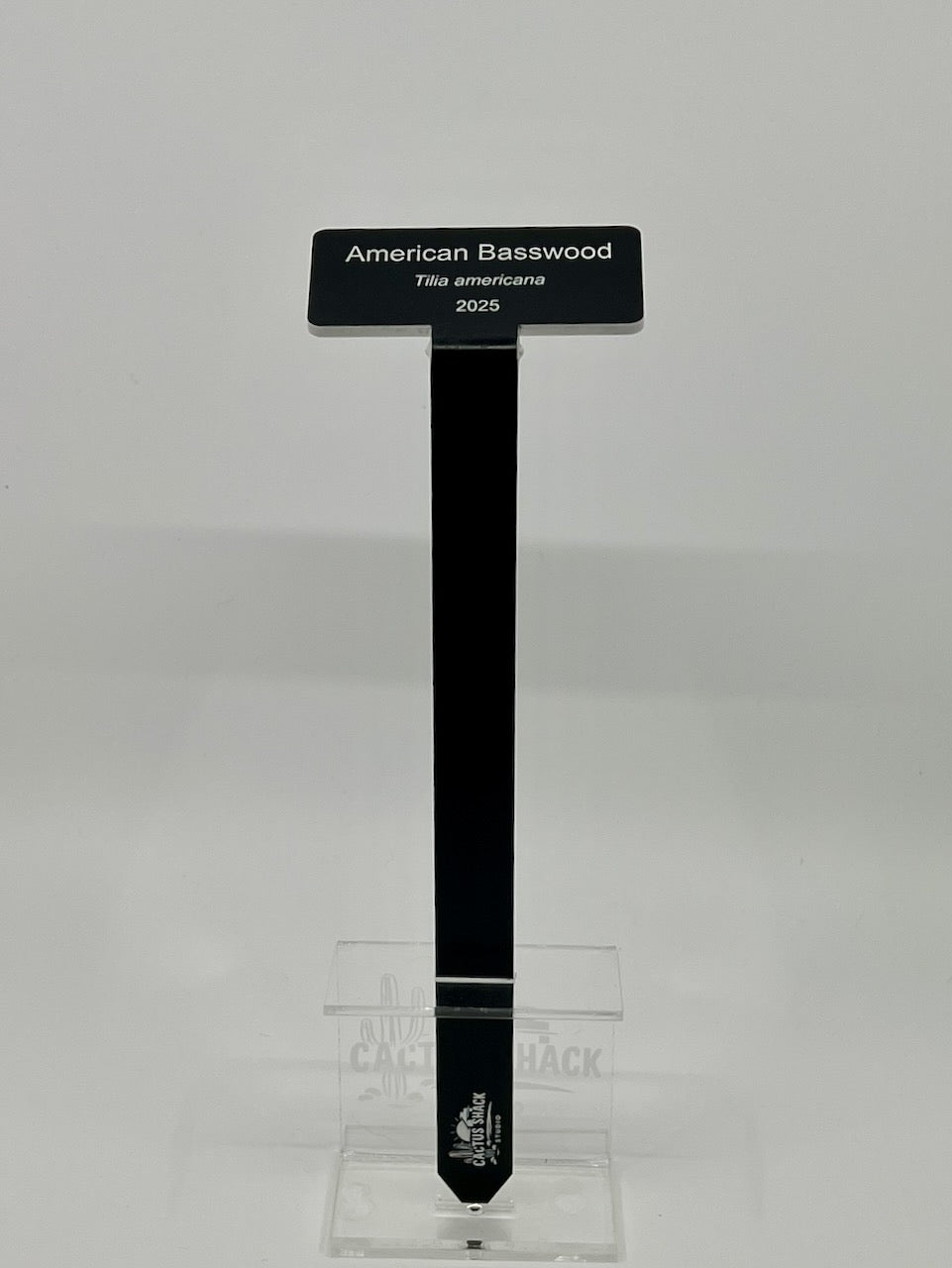 Engraved acrylic plant marker showing the three-line collector format — common name, botanical name and planted year | Cactus Shack Studio