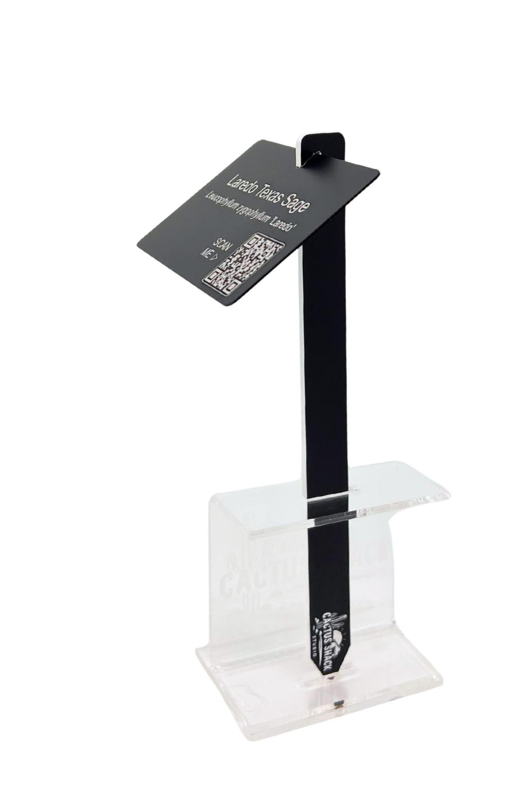 Close-up of engraved aluminum tag on acrylic stake
